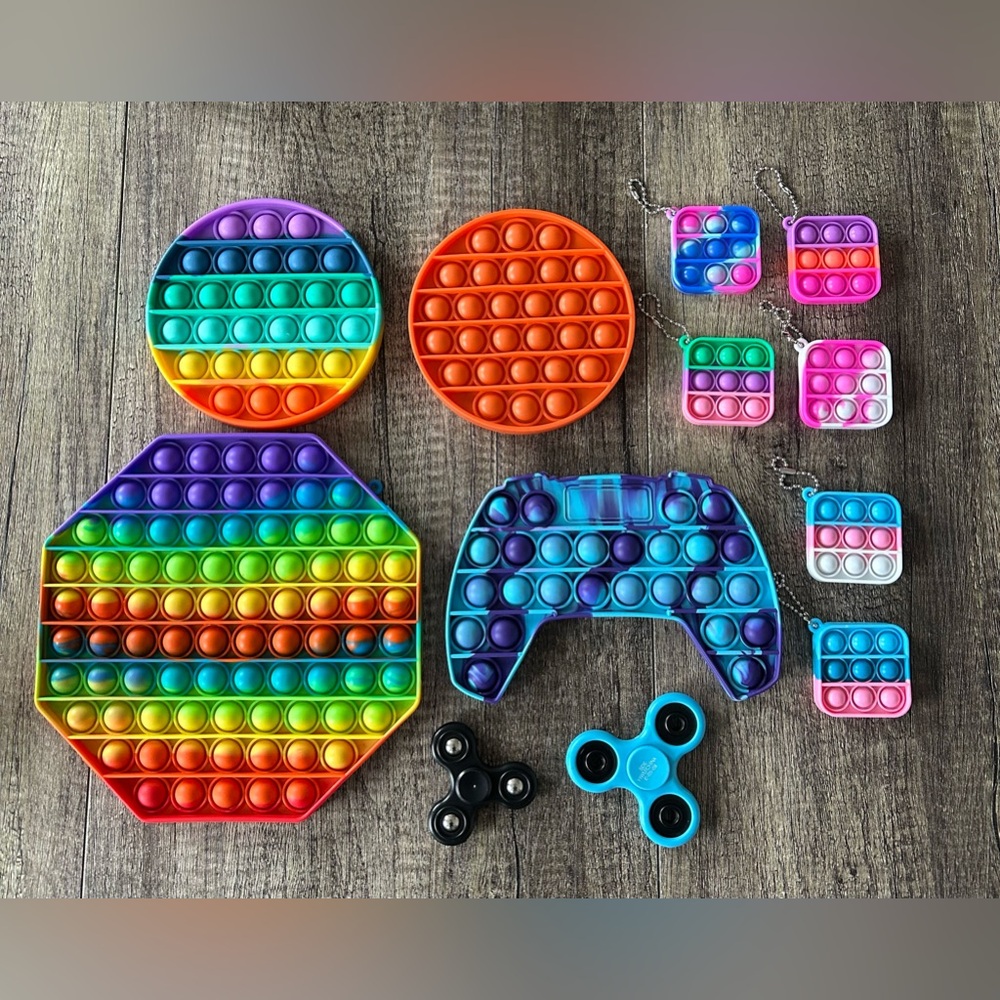 Lot of sensory toys bubble poppers fidget spinners